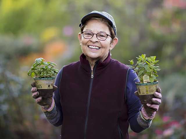 Woman holding plants