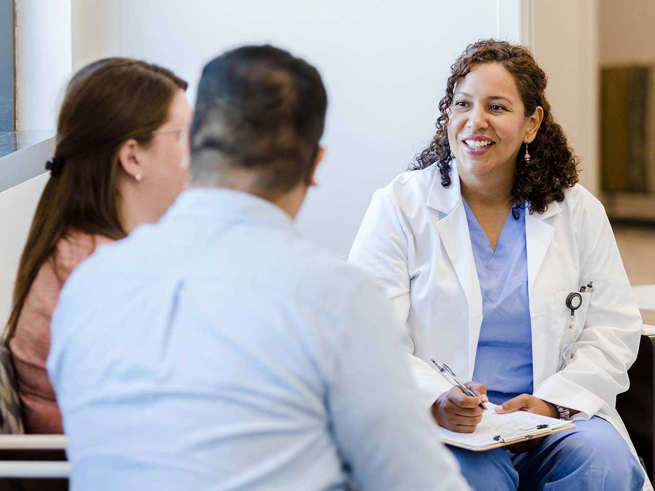 Couple talking to provider