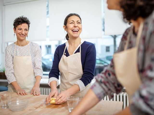 Women cooking together.