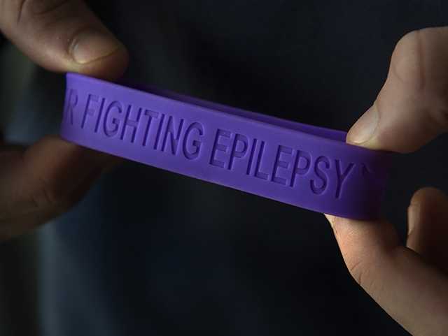 Bracelet with Fighting Epilepsy engraved.