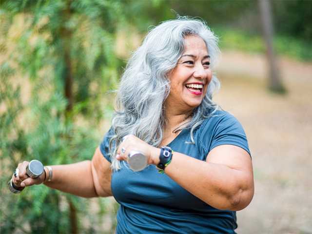 woman smiling outdoors