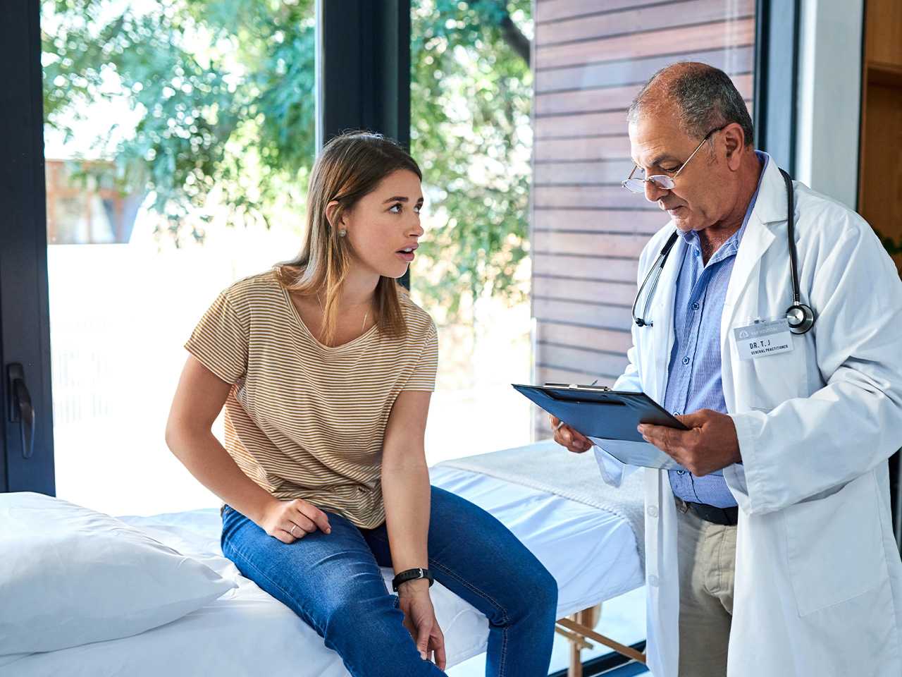 Healthcare provider talking to patient.