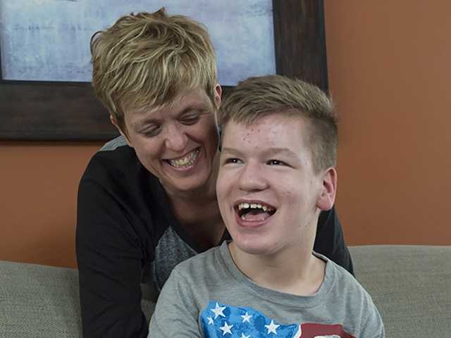 Mother and child smiling in waiting room