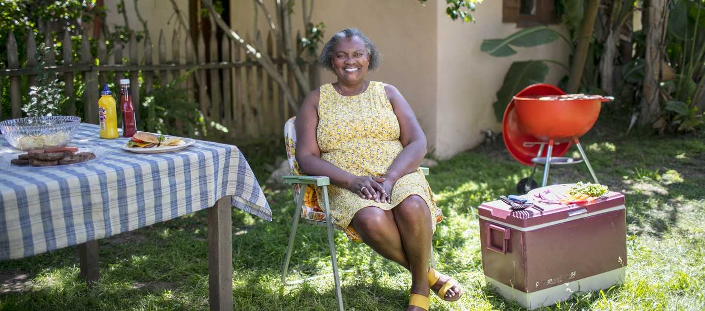 woman in chair at picnic