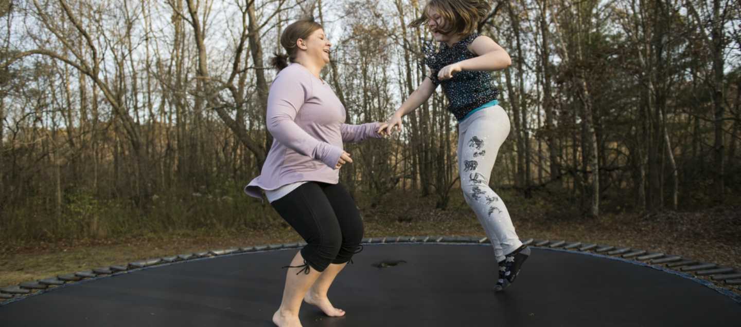 Girls jumping on a trampoline